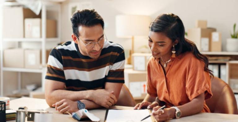 Two plan fiduciaries reviewing a document