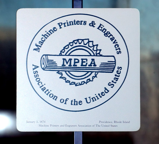 Machine Printers and Engravers Association of the United States logo