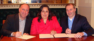 David Dikter, ATIA Chief Executive Officer, ODEP Assistant Secretary Kathy Martinez, and Daniel Hubbell, Chair of the ATIA Board sign the Alliance agreement.