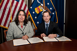 Assistant Secretary Kathleen Martinez and Max Stier, President & CEO, Partnership for Public Service, sign ODEP's Alliance Agreement.