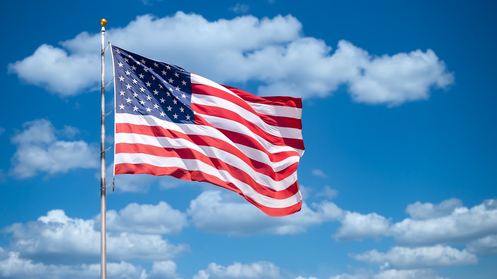 USA flag on blue sky