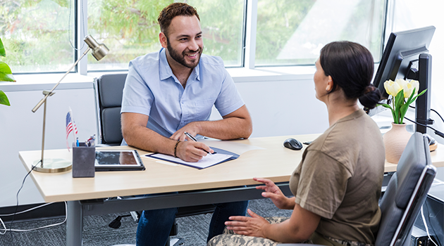 man interviewing a woman