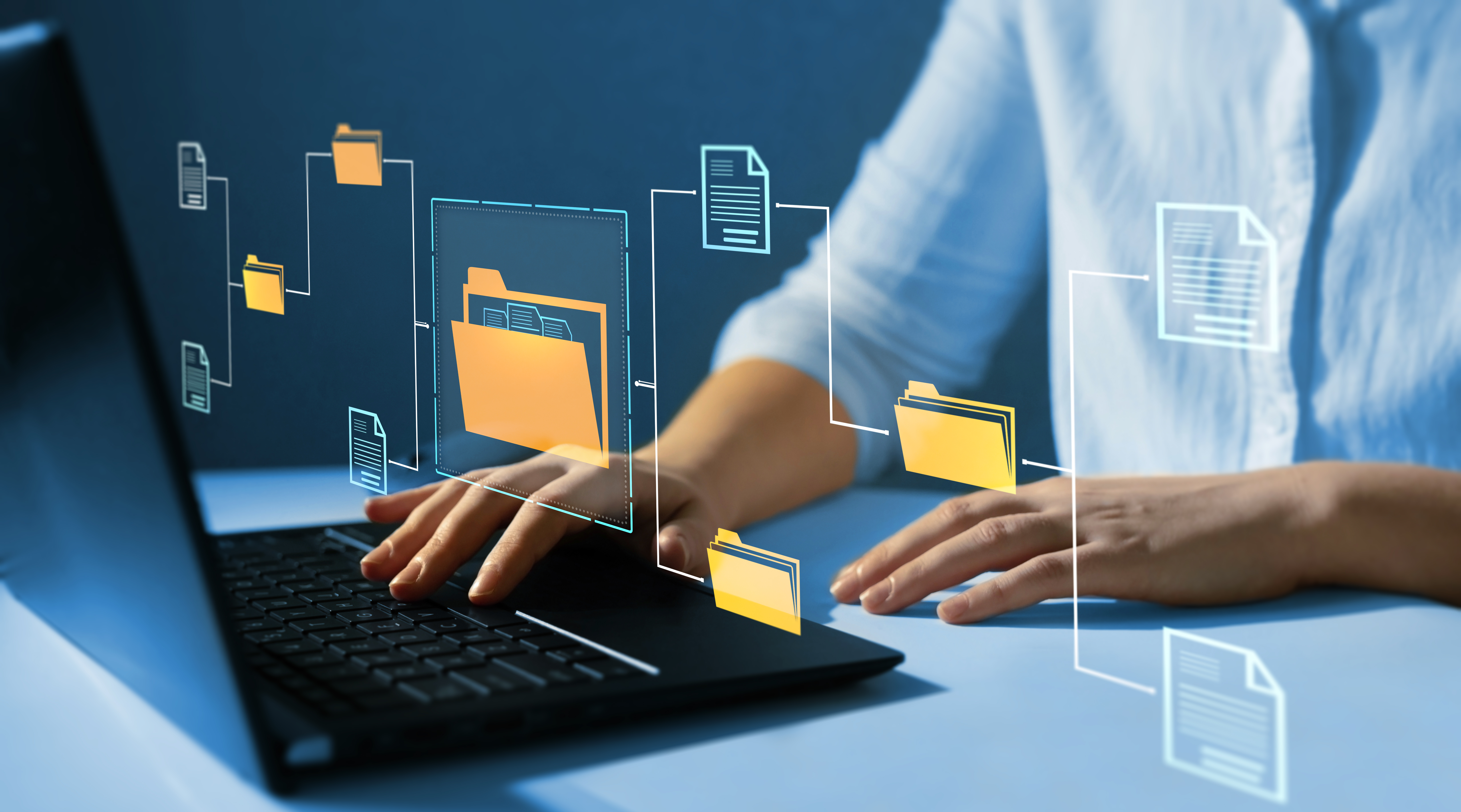 laptop with files folders
