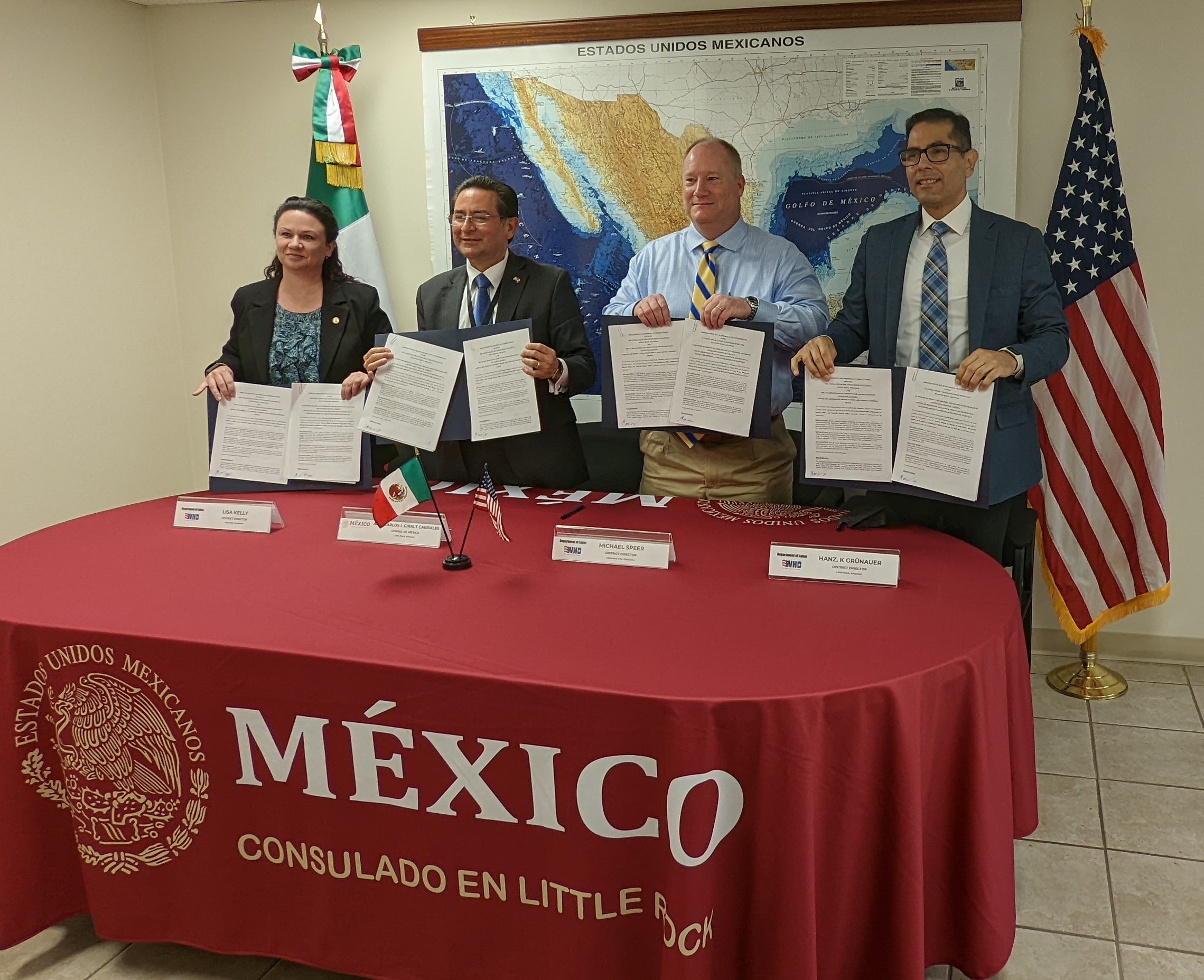 Lisa Kelly, of the Wage and Hour Division’s Nashville office and Carlos I. Giralt Cabrales of Mexican Consulate in Little Rock join the division’s Michael Speer and Hanz Grünauer to renew an alliance to protect native Mexican workers.