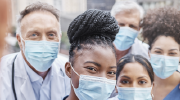A group of healthcare workers in masks.