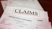 Insurance claims forms, slightly blurred 