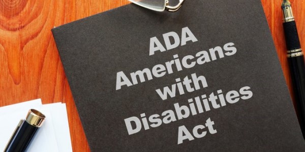 Black book with the title, âADA Americans with Disabilities Act,â on the cover 