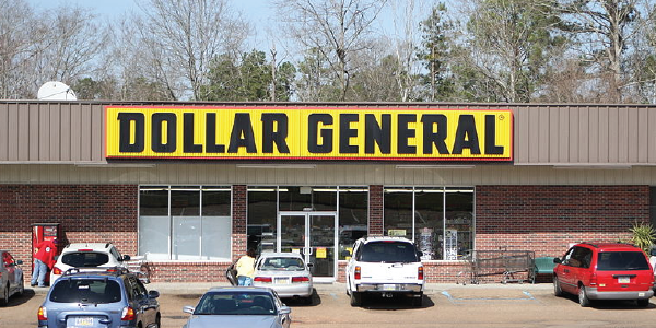 Exterior of a Dollar General store, with the company logo above the doorway.