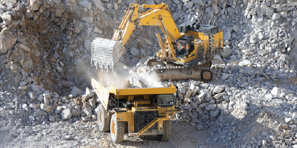 Mining machinery working with big stones. 