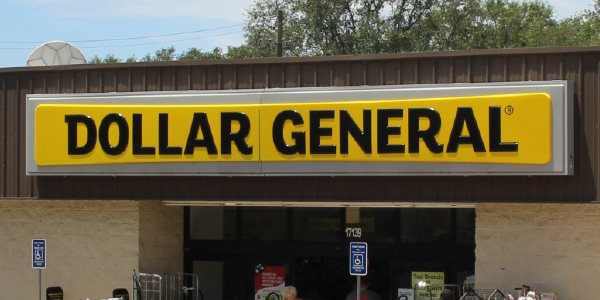 Exterior of a Dollar General store with the company’s logo visible above the entrance. Credit: Michael Rivera via Wikipedia. Creative Commons License.