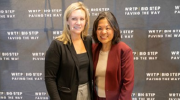 Julie Su stands with a woman in front of a backdrop reading WRTP Big Step Paving the Way.