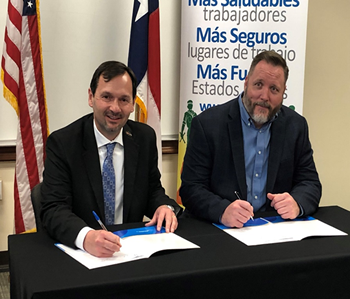 OSHA Regional Administrator Eric Harbin and Damage Prevention Council President John Sparks sign two-year alliance to help keep workers in trenching and excavation operations safe.