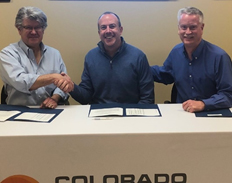 (From Left) OSHA Denver Area Director Herb Gibson, CCA  Executive Director Tony Milo,  and Englewood Area Director  Dave Nelson sign a two-year  alliance. 