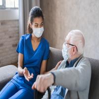 Caregiver with elderly patient