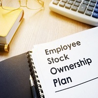  a spiralbound notebook with the words Employee Stock Ownership Plan