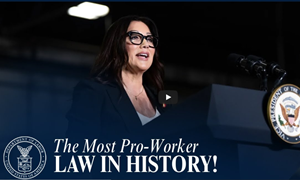 Secretary Chavez-DeRemer, wearing a dark suit, speaks at a podium with the presidential seal.