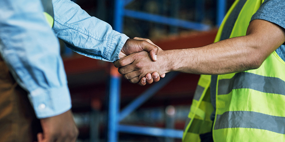 workers shaking hands