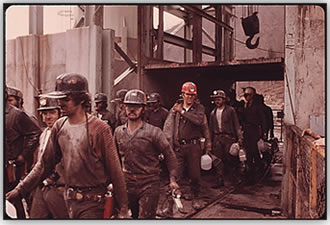 The first shift of miners at the Virginia-Pocahauntas Coal Co. Mine No. 4 near Richlands, Va., leave the elevator. (Credit: National Archives, 556393)