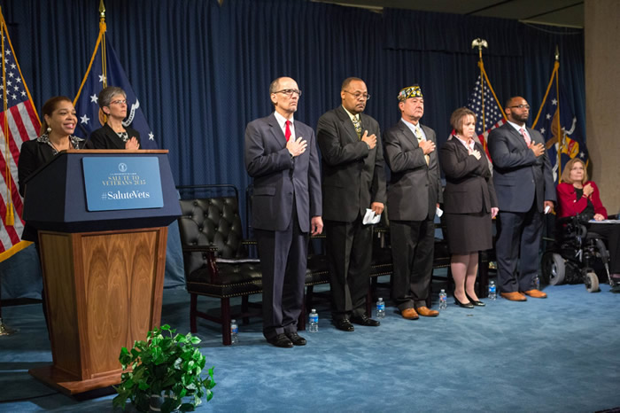 The Air Force Color Guard, Military District of Washington,  presented the colors at the start of the 2015 Salute to Veterans program at the  U.S. Department of Labor. Secretary of Labor Thomas E. Perez, third from left,  welcomed guests and panelists for a discussion on disabled veterans in the  workforce.