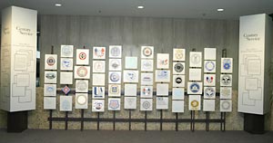Photograph of the Century of Service Honor Roll Exhibit at the Department of Labor, also links to an enlarged version