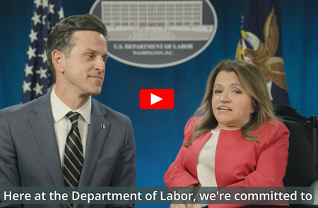 Julie Hocker, Assistant Secretary for Disability Employment Policy with Henry Mack, Assistant Secretary for Employment and Training. The American and Department of Labor flags in background.  