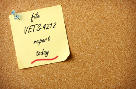 yellow sticky note that says file VETS 4212 report today with red underline
