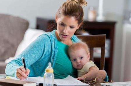 Women working with baby