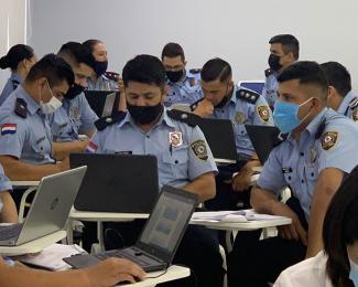 Members of the Paraguayan National Police participate in a training on child labor, forced labor, and human trafficking.